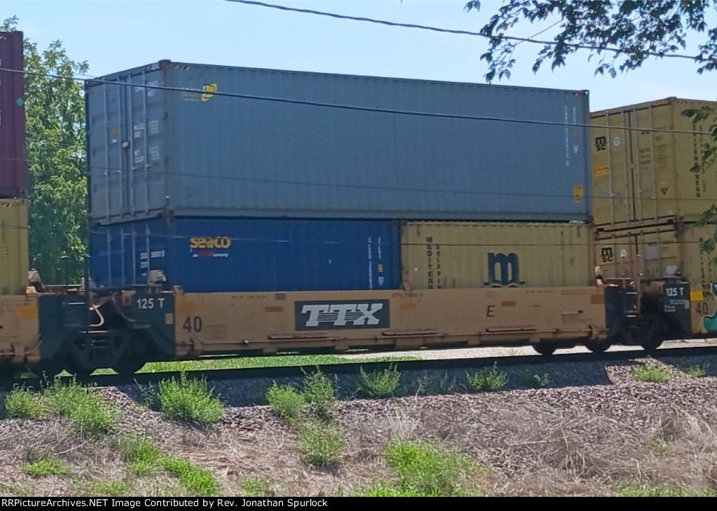 DTTX 750943E and three containers